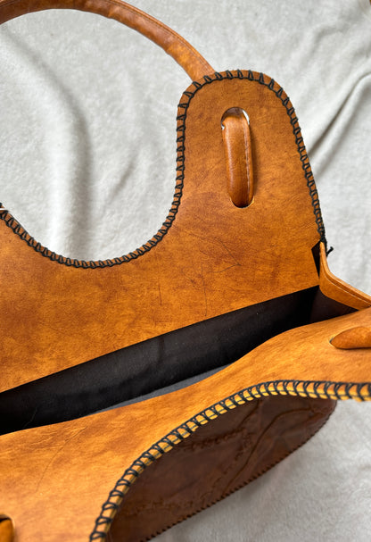 1970s Tooled Leather Patchwork Saddlebag